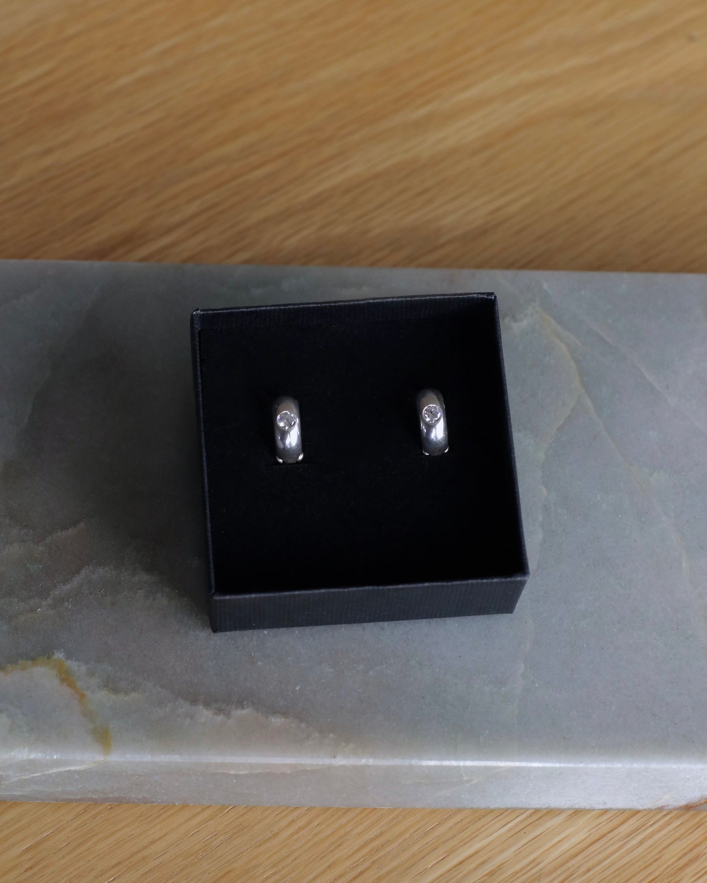 Silver Huggies With White Cubic Zirconia